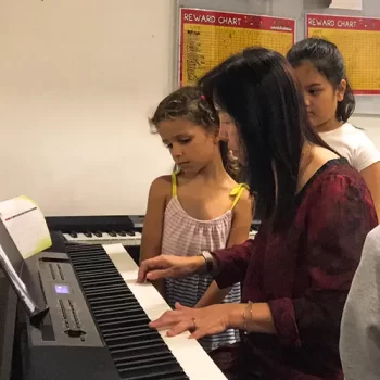 teacher grace students at tmw music school 1